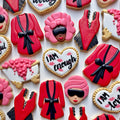 Decorative cookies with spa themed designs on a white background